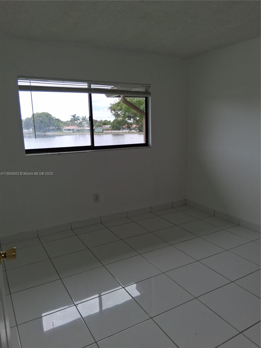 TAMARAC GARDENS CONDOMINI - Residential Lease