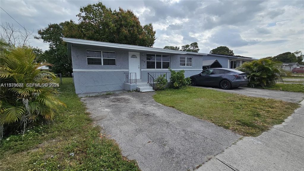 Photo of 374 NW 31st Ave, Pompano Beach, FL 33311 (MLS # A11979698)