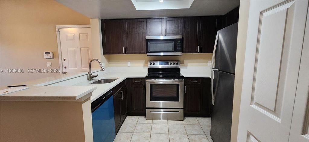 Photo of 4151 N Haverhill Rd #1524, West Palm Beach, FL 33417 (MLS # A11998002)