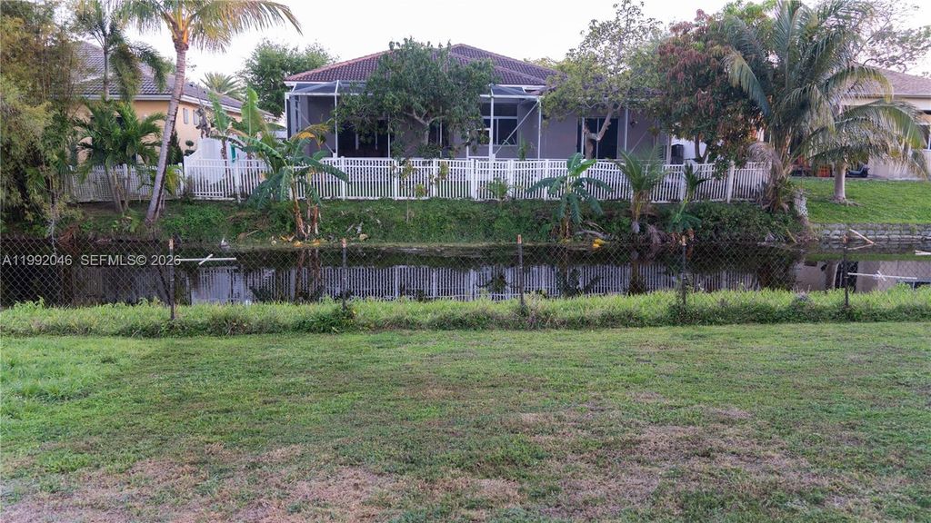 Photo of 7960 NW 14th St, Pembroke Pines, FL 33024 (MLS # A11992046)