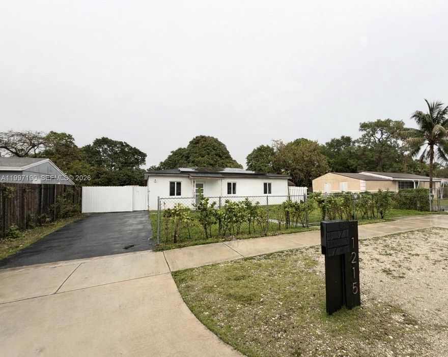 Beautiful fully updated home, with NO HOA, sitting on an ample lot with enough space for a boat or RV. This home has new kitchen, stainless steel appliances, impact windows and doors, new A/C, tile floors throughout, fully built closets, exterior electrical, sewer connection, and gas connections, and a large yard perfect for boat or RV! This amazing home is located near top schools, dining, highways, and just minutes away from the beach! Ask how you can receive a credit towards your closing cost when you finance through our broker, TMG Mortgages LLC!