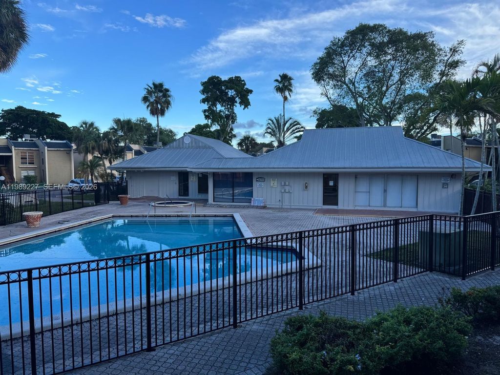 Photo of 4453 Treehouse Ln #C15, Tamarac, FL 33319 (MLS # A11989227)
