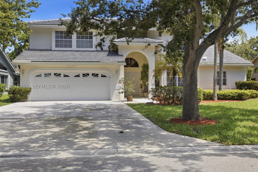 Photo of 10431 NW 48th Mnr, Coral Springs, FL 33076 (MLS # A12041452)