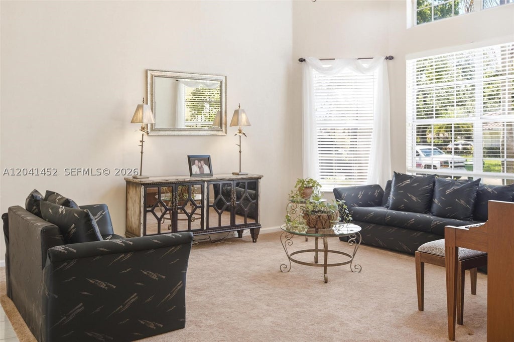 Photo of 10431 NW 48th Mnr, Coral Springs, FL 33076 (MLS # A12041452)