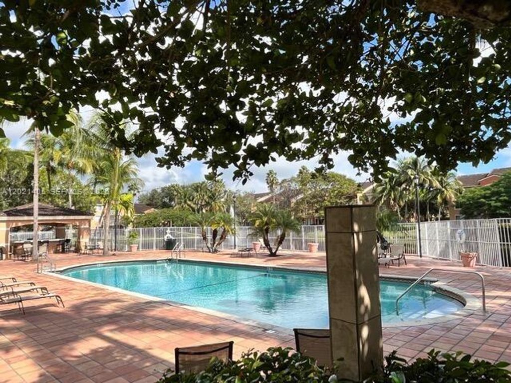 Photo of 3870 Lyons Rd #209-8, Coconut Creek, FL 33073 (MLS # A12021405)