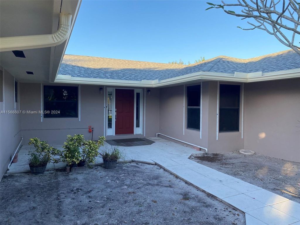 Photo of 16711 SW 52nd Pl, Southwest Ranches, FL 33331 (MLS # A11566607)