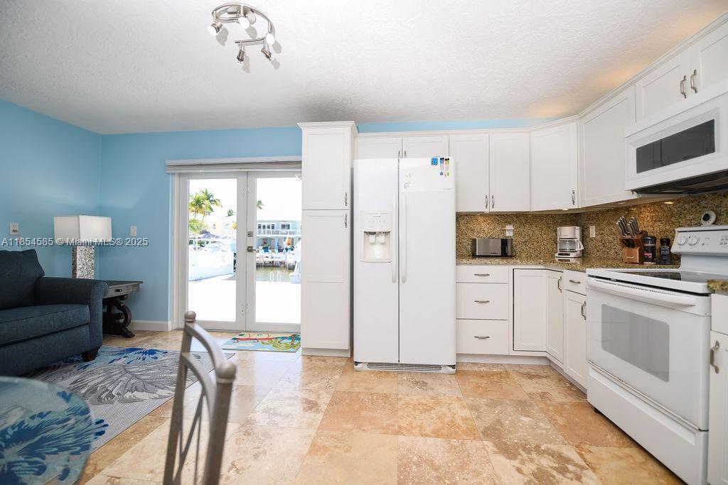 KEY LARGO OCEAN SHORES AD - Residential Lease