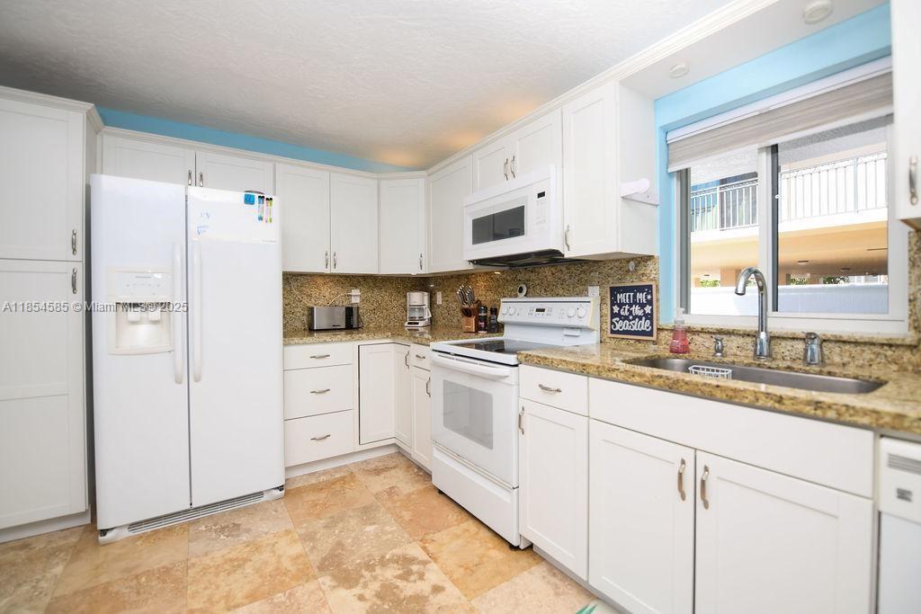 KEY LARGO OCEAN SHORES AD - Residential Lease