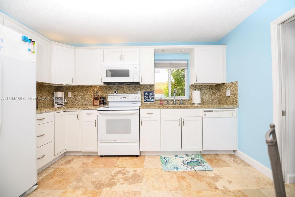 KEY LARGO OCEAN SHORES AD - Residential Lease