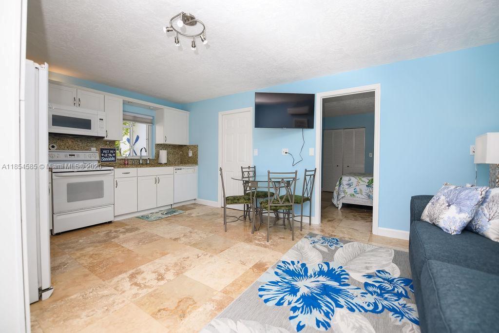 KEY LARGO OCEAN SHORES AD - Residential Lease