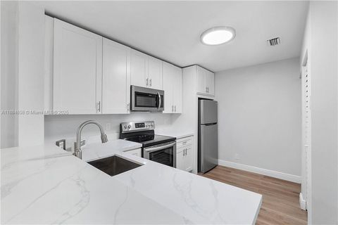 Photo of 5861 Riverside Dr #205A2, Coral Springs, FL 33067 (MLS # A11884858)