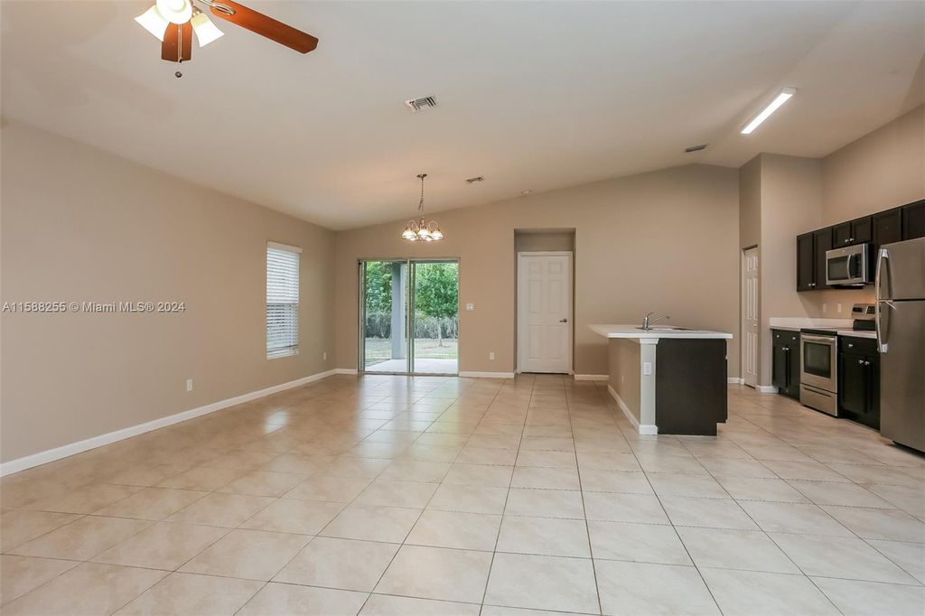 Photo of 486 SW Lawler Ave, Port Saint Lucie, FL 34953 (MLS # A11588255)