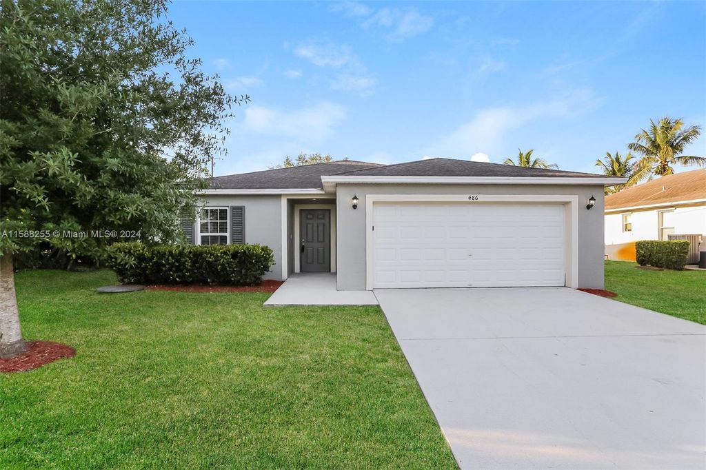 Photo of 486 SW Lawler Ave, Port Saint Lucie, FL 34953 (MLS # A11588255)