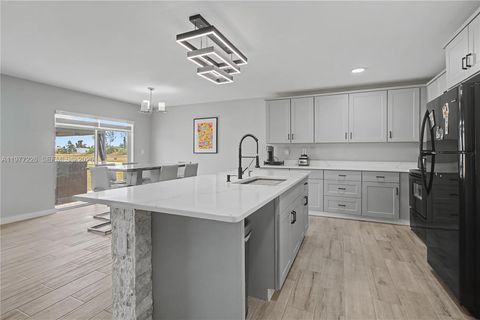 Tiny photo for 3701 NE 14th Ave, Cape Coral, FL 33909 (MLS # A11977226)