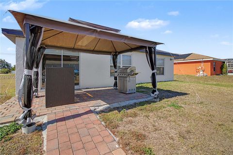 Tiny photo for 3701 NE 14th Ave, Cape Coral, FL 33909 (MLS # A11977226)