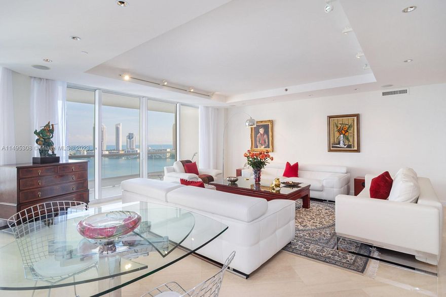 STUNNING FOUR BEDROOMS W/ ALL EN-SUITE BATHROOMS PLUS A HALF BATHROOM. MARBLE & WOOD FLOORING THROUGHOUT. SPECTACULAR OCEAN AND CITY VIEWS. ELEVATOR TAKES YOU TO YOUR PRIVATE FOYER FOR MAXIMUM CONVENIENCE & PRIVACY. LOCATED IN THE EXCLUSIVE RESIDENCE DU CAP BUILDING WITH A NEW AND BEAUTIFUL BUILDING POOL. ON THE 82 ACRES OF WILLIAMS ISLAND. DOCK YOUR YACHT AT THE WILLIAMS ISLAND MARINA, WORKOUT AT THE 27,000 SQFT EUROPEAN SPA WITH PRIVATE TRAINERS & FULL SCHEDULE OF CLASSES, GET A MASSAGE & BEAUTY TREATMENTS, PLAY TENNIS AND PICKLEBALL. EAT AT ONE OF THE RESTAURANTS. PLEASURE TO SHOW. COME SEE FOR YOURSELF. FURNITURE AVAILABLE! 15 CLAY TENNIS COURTS, 4 PICKELBALL COURTS, CLUB EVENTS, PARTIES, DOGGIE PARK, CHILDRENS PLAYGROUND, WALKWAYS ALONG INTRACOASTAL, GUARD GATE AND MUCH MORE.