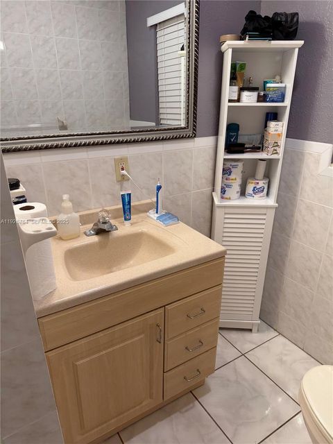 Photo of 2926 NW 191st Ln, Miami Gardens, FL 33056 (MLS # A11926764)