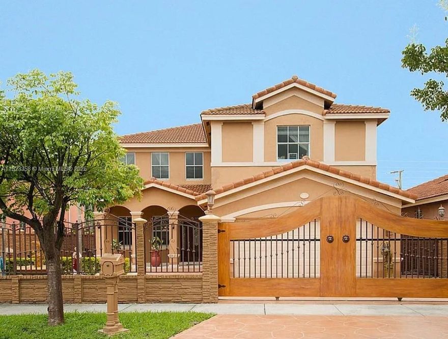This beautifully well maintained 4-beds, 4-baths home in Miami, 2,826 sqft of living space, featuring wood flooring upstairs, matching custom kitchen cabinets & porcelain finishes throughout. New fridge & stove (2024), complemented by a washer & dryer also updated in 2024. The home includes custom made doors in all the property, including French doors, walk-in closets with cedar wood in the master bed, & two attics, 1 in the garage & another in the master bedroom. Includes a dual-sink bath, a garage with an extra closet, & a backyard oasis featuring a pool with a waterfall, jacuzzi, BBQ area, & wall fence for added privacy. Equipped with shutters & a 2021 AC system, room with full bath & walking closet, home office, utility closet in the garage, wall throughout the property, gate entrance