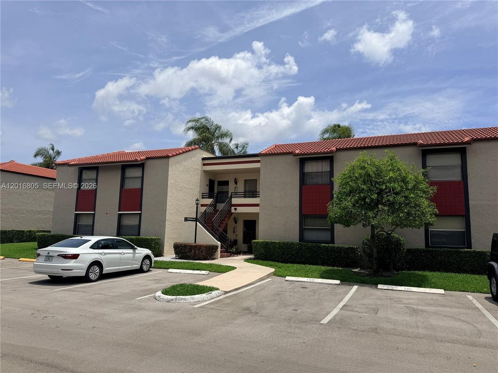 Photo of 11423 NW 10th St #11423, Pembroke Pines, FL 33026 (MLS # A12016805)