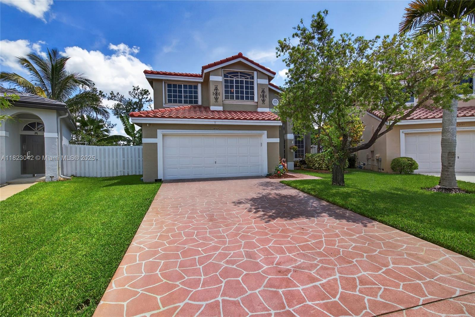 Discover your 4-bed/2.5-bath dream home in the desired Silver Lakes community! This updated two-story residence features a corner lot with partial lake views and complete hurricane protection. This home's modern kitchen, featuring quartz countertops, stainless steel appliances, and designer cabinets, will knock your socks off. The spacious primary suite boasts a luxurious en-suite bath. The versatile loft, currently used as an office, offers a balcony, and the stylish living spaces include a formal living and dining area, as well as a cozy family room. Enjoy outdoor relaxation in the screened patio and paved area, complemented by a concrete-stamped driveway that leads to a two-car garage. The community offers parks and easy access to top-rated schools, shopping, and major highways.