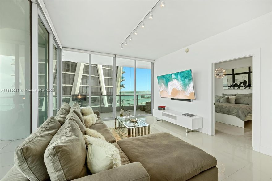 This Magnificent Modern Luxury fully furnished unit boasts 2 bedrooms, 2.5 bath, 3 wraparound balconies with panoramic views, intercostal, ocean and the city. Italian fine cabinetry, Meile appliances, marble countertops, porcelain floors, motorized shades. All bedrooms with ceiling to floor glass doors opening to balcony. 900 Biscayne is one of the best buildings in Miami across from Kaseya Arena (Miami Heat Games/Concerts), Bayside Park, PAMM Museum, Frost Science Museum. Next to One Thousand Museum ultra luxury condo by Zaha Hadid. Building amenities: 2 outdoors pools, outdoor & indoor hot tubs, indoor spa, 2 fitness centers, grill & entertainment area, valet, 24 hr security, doorman, multiple restaurants nearby. Most desirable downtown location.