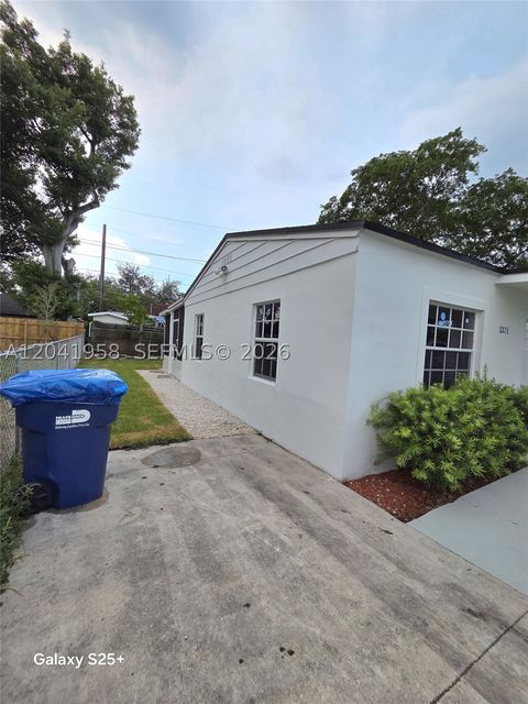 Tiny photo for 1321 NW 82nd St, Miami, FL 33147 (MLS # A12041958)