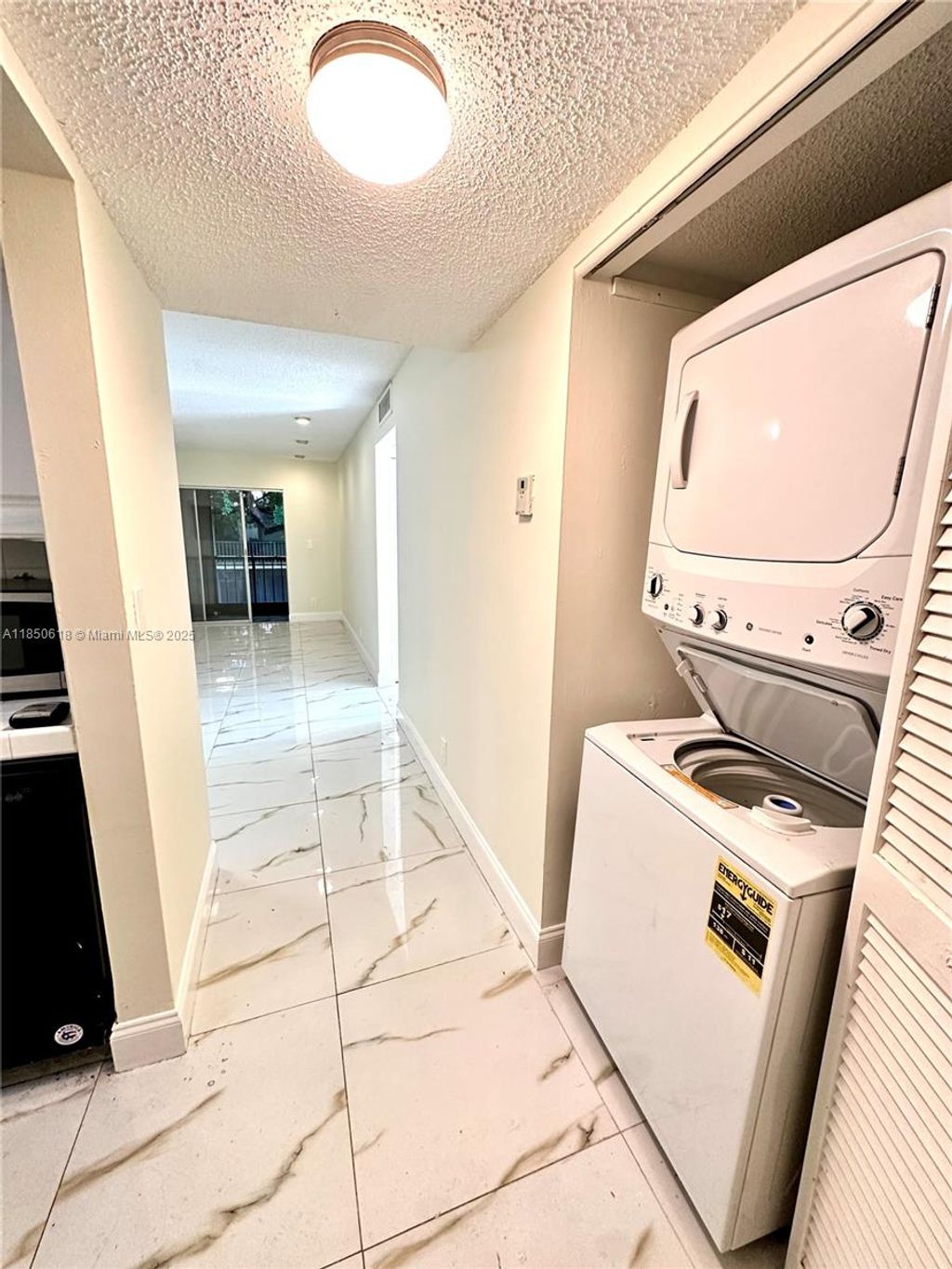 Photo of 4141 NW 90th Ave #206, Coral Springs, FL 33065 (MLS # A11850618)