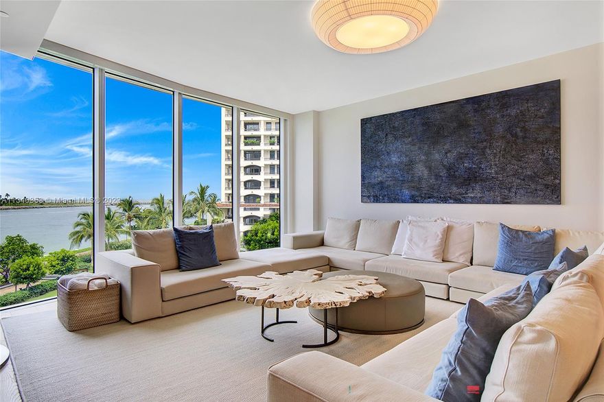 Located in the east stack of Palazzo Della Luna, Fisher Island’s newest building, this unit is accessed by private elevator featuring 3BR/3+1BA & 3,620 SF of luxury. Wide plank oak wood floors throughout, spacious flow through dining & living room w/floor to ceiling windows & access to a wrapping terrace made to entertain w/comfortable seating areas & direct views to Biscayne Bay, Government Cut, Miami Beach & Ocean. The Boffi designed gourmet kitchen features top-of-the-line Miele and Subzero appliances, wine cooler & beautiful 16-foot white Statuary Marble countertop w/eat-in seating. The spacious principal suite has direct terrace access with water views and a beautiful principal bathroom with glass shower and oval spa tub. Enjoy 6-star Palazzo amenities & Fisher amenities.