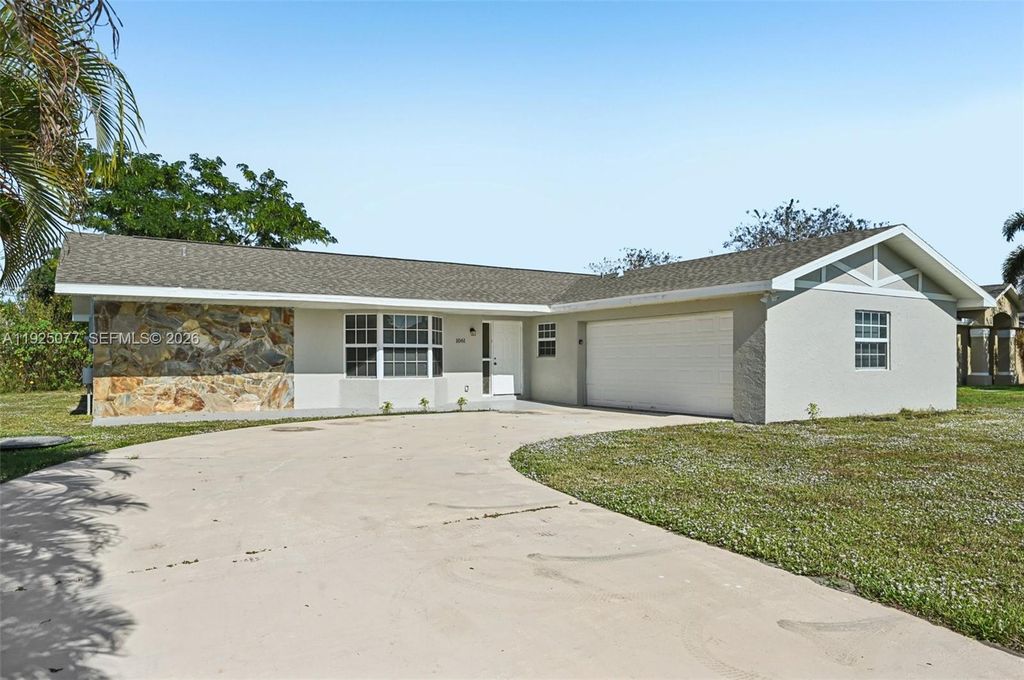 Photo of 1061 SW Sudder Ave, Port St Lucie, FL 34953 (MLS # A11925077)