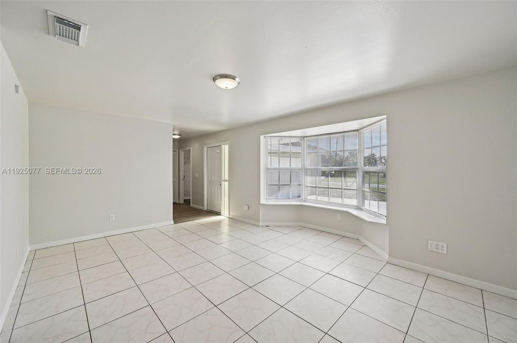 Photo of 1061 SW Sudder Ave, Port St Lucie, FL 34953 (MLS # A11925077)