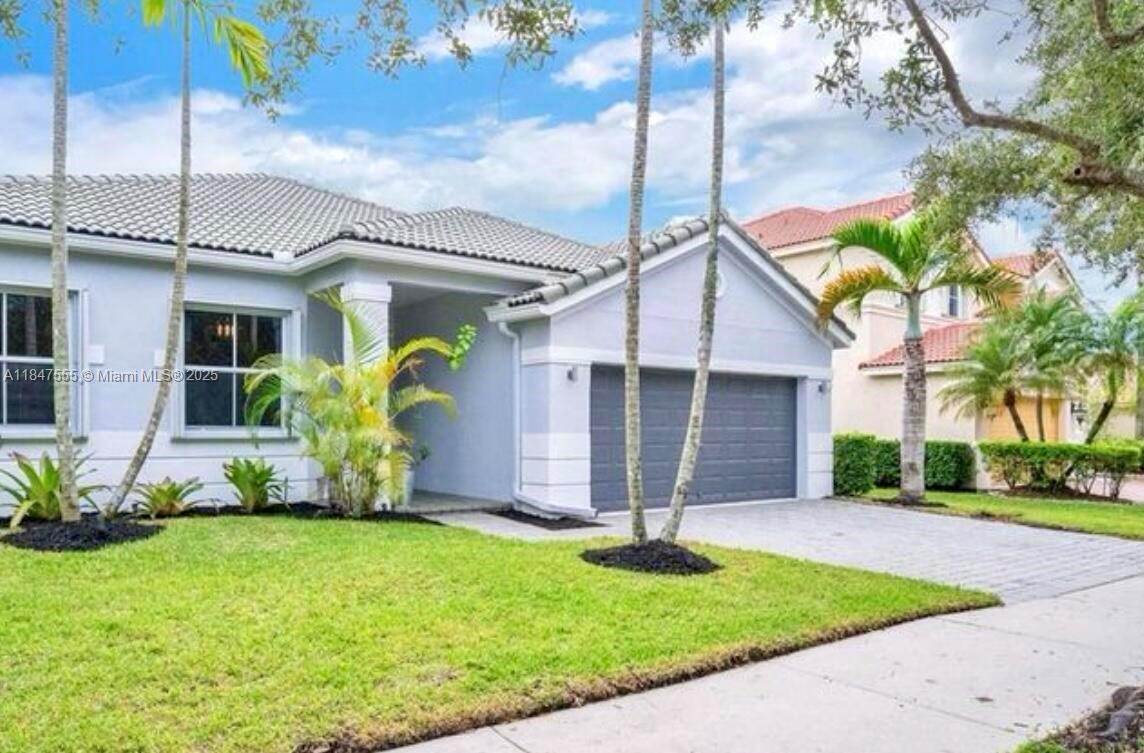 **WELCOME TO PARADISE** This luxury remodeled home has a serene backyard oasis with a SALT POOL, HOT TUB and WATER VIEWS. 4 BEDROOMS / 2 BATHROOMS. OPEN FLOOR PLAN with an updated kitchen in the center of the home overlooking the family room which is great for entertaining. One of the bedrooms converted to a professionally designed HOME OFFICE which is perfect for teleworking. SCREENED-IN POOL ENCLOSURE. Professionally TINTED WINDOWS. Located in one of Weston’s premier gated communities where residents truly enjoy resort-style living with an incredible clubhouse, swimming pools, waterslide, kids waterpark, heated lap pool, playground, basketball court, roller hockey rink, soccer field, baseball field, miniature golf, snack cafe and much more! Easy access to I75 and I595.
