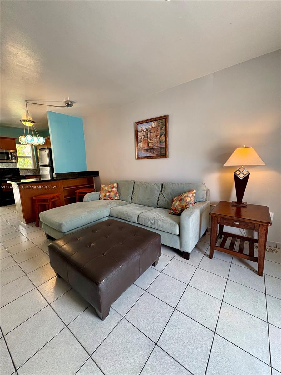 THIS FURNISHED STUDIO APT WITH BALCONY & SECURED ASSIGNED PARKING REFLECTS SOUTH BEACH LAID BACK LIVING, WITH A COZY AND SLEEK VIBE. THE QUEEN MURPHY BED MAKES THE LIVING ROOM COMFY YET FUNCTIONAL, AND THE KITCHEN BOASTS AN OPEN FEEL WITH S/S APPLIANCES AND AN EAT IN KITCHEN COUNTER, PERFECT FOR ENTERTAINING OR WORKNG FROM HOME.CONDO HAS A WALK IN CLOSET, AND A CLEAN,CONTEMPORARY BATHROOM WITH MOD LIGHTING, GLASS SHOWER DOOR, AND AMPLE STORAGE. BLDG HAS A LUSH FURNISHED COURTYARD & LAUNDRY FACILITIES. JUST A SHORT DISTANCE TO THE BEACH,FLAMINGO PARK, BARS AND RESTAURANTS. UNIT ALSO FOR RENT.ALL ASSESSMENTS PAID!! 60 YR RECERTIFICATION IN PROGRESS AND UNIT CAN BE RENTED IMMEDIATELY. CAN BE SOLD FURNISHED OR UNFUNRISHED. SEE VIDEO UNDER VIRTUAL TOUR