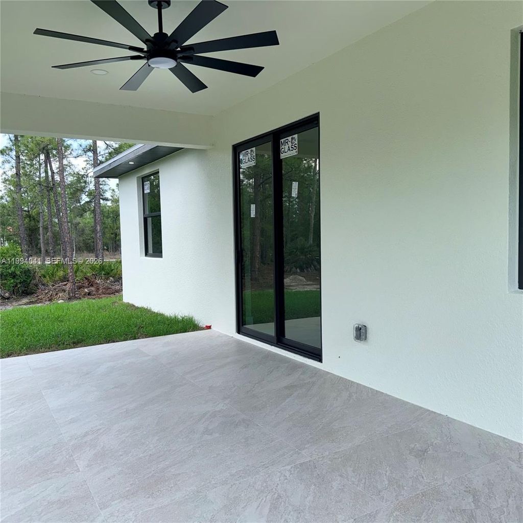 Photo of 2102 E 13th St, Lehigh Acres, FL 33972 (MLS # A11994041)