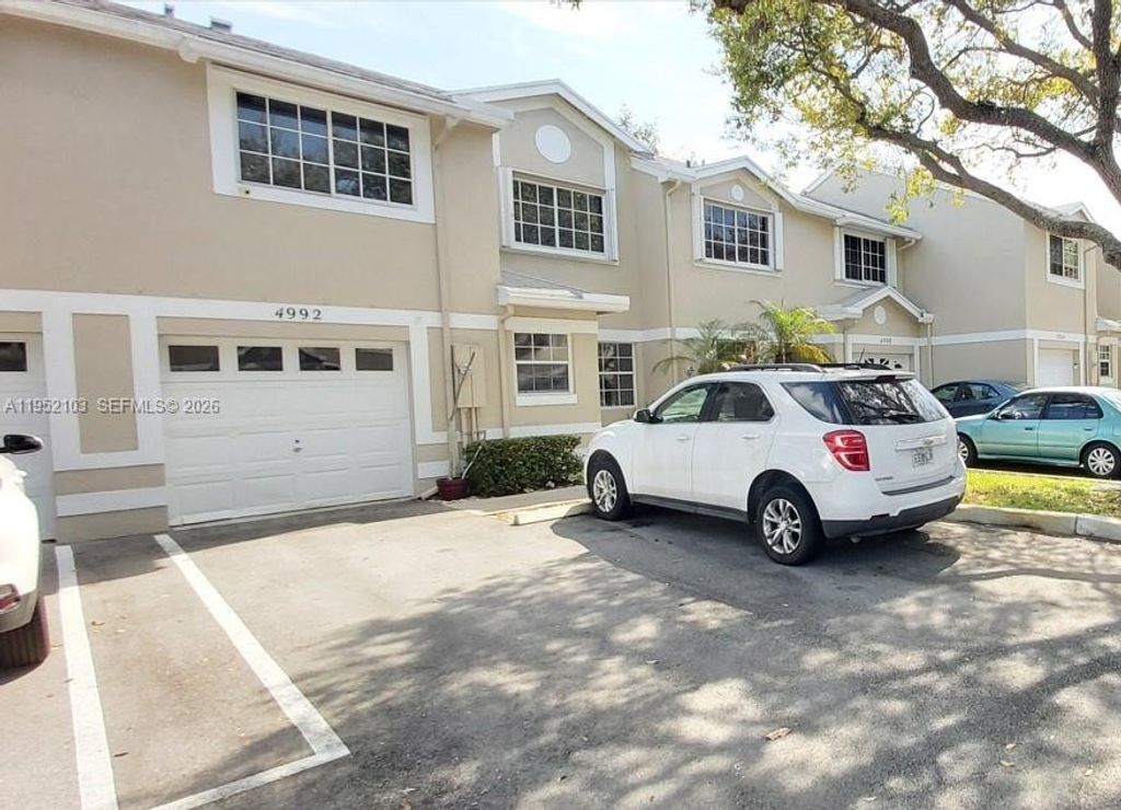 Photo of 4992 SW 123rd Ter #4992, Cooper City, FL 33330 (MLS # A11952103)