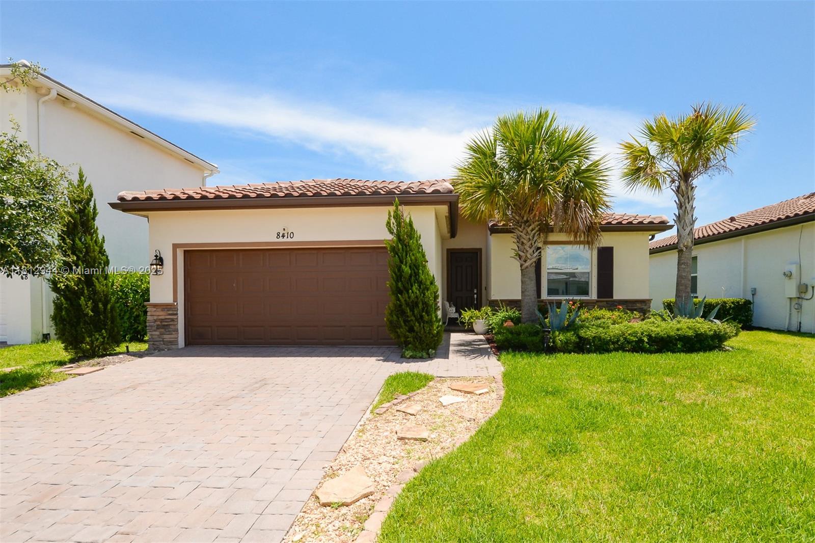 Immaculate home in the tranquil Cooper Creek community of Port St. Lucie! This beautifully designed 3-bedroom, 2-bath home showcases a split open floor plan with soaring volume ceilings throughout. The upgraded kitchen features stainless steel appliances, granite countertops, and sleek cabinetry, perfect for everyday living and entertaining.
Enjoy breathtaking water views from your spacious, custom-built porch and patio, ideal for relaxing or hosting guests. The master suite includes two walk-in closets, dual sink vanity, and a walk-in glass shower for a spa-like experience.
Located in a quiet, well-maintained neighborhood with a low HOA, residents enjoy access to a community pool, clubhouse, fitness center, playground, and more.
Schedule your showing now! This house won't last.