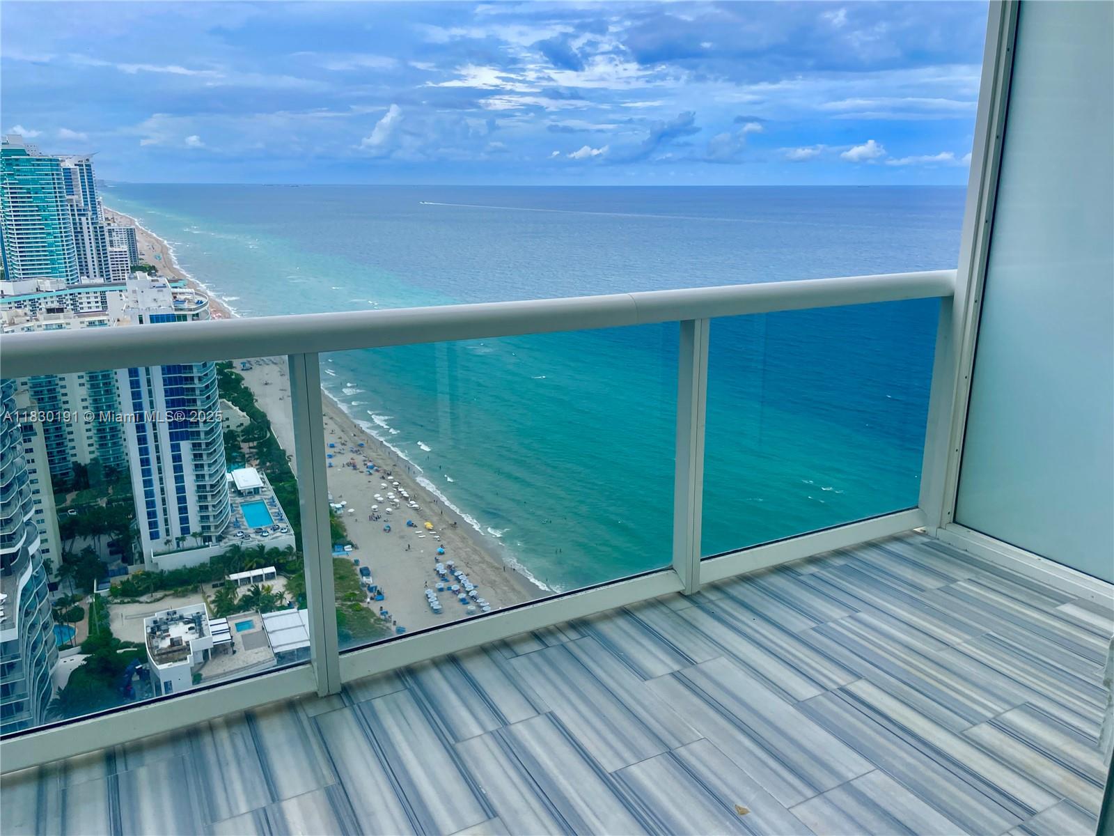Beautiful renovated condo in the heart of Hallandalle Beach. Don't miss this spectacular unit with amazing and unobstructed ocean view. TOP OF THE LINE 12 in the building. Featuring a modern open kitchen with stainless steel appliances, quartz countertops and stylish finishes throughout. The building offers top amenities, including 3 pools, fully equipped fitness center, spa and much more. Short drive to Gulfstream park, Aventura Mall, walking distance to restaurants and grocery stores. Perfect as a primary residence, vacation, or investment opportunity. 5 STAR RESORT STYLE. This unit is fully furnished Move - In READY !!!