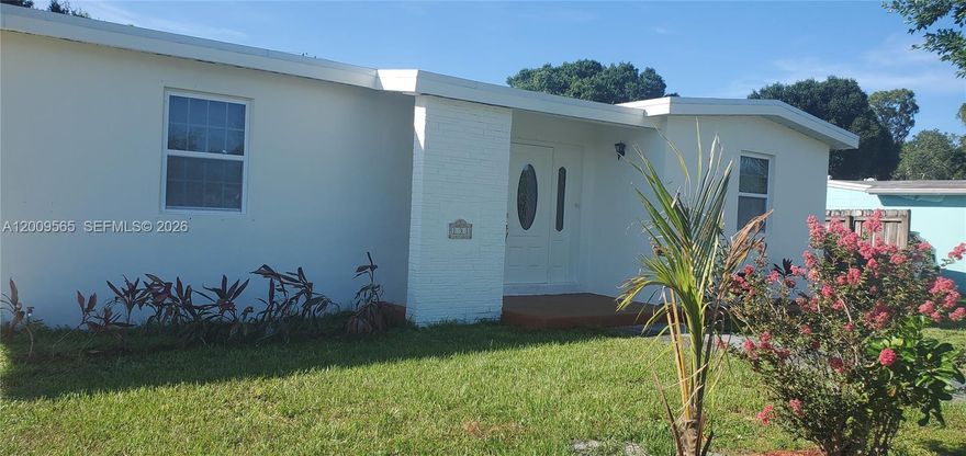 This solid concrete block house has 3 bed 1 bath single house has impact windows upgraded kitchen with plenty of cabinets and countertops. A carport to park your vehicle 2022 roof; , laundry inside huge backyard for barbecue and fence throughout property