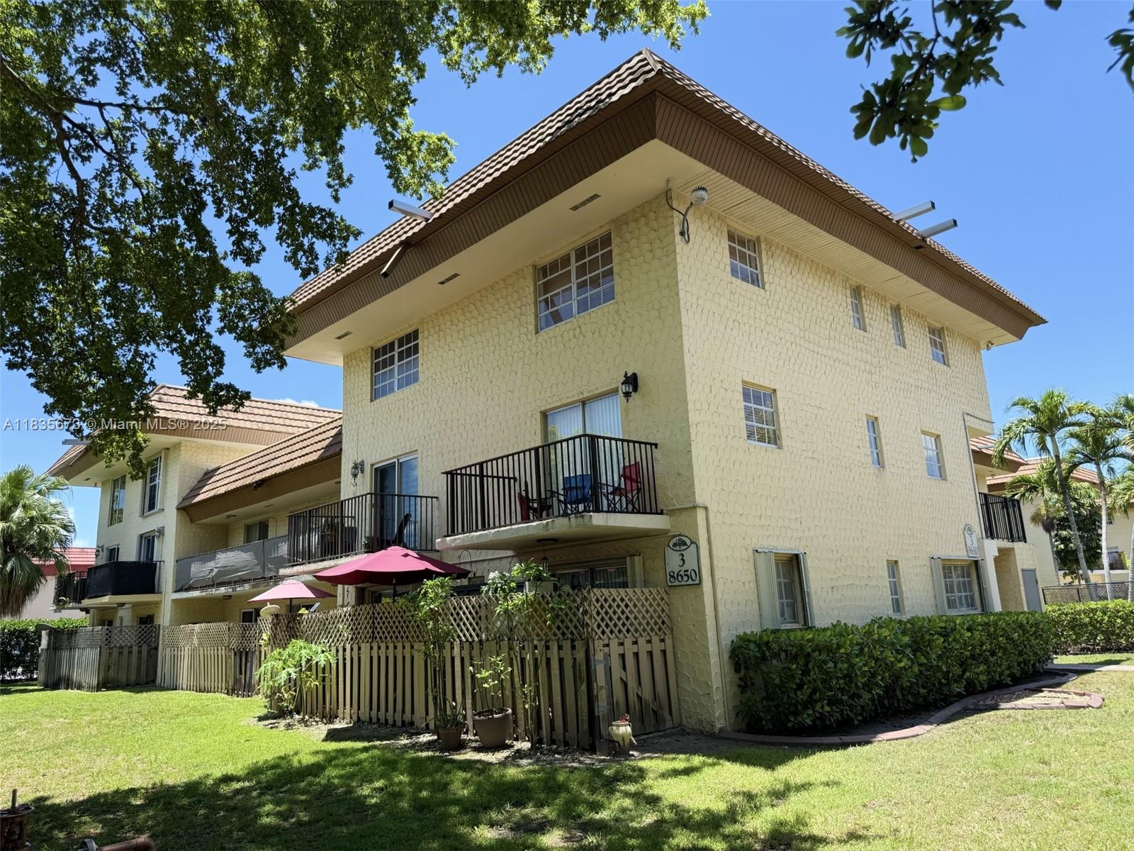 Welcome to this beautifully maintained 2-story condominium located in the highly desirable Courtyards at Kendall community. This spacious unit features 3 bedrooms and 2 full bathrooms, with the added convenience of one bedroom and bathroom on the first floor. The interior has tile flooring throughout, new carpeting on the stairs, and has been freshly painted. Enjoy the ease of having your own washer and dryer, eliminating the hassle of shared laundry facilities. Step outside to a large private patio, perfect for enjoying your morning coffee or unwinding in the evening. Centrally located with easy access to major expressways, top-rated public and private schools, shopping centers, and popular restaurants. Association has reserves and Sellers are paying off special assessment at Closing.