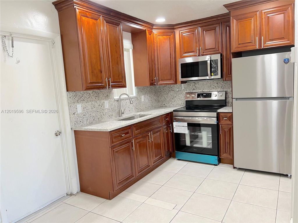Photo of 1826 N 22nd Ave #1826, Hollywood, FL 33020 (MLS # A12019596)