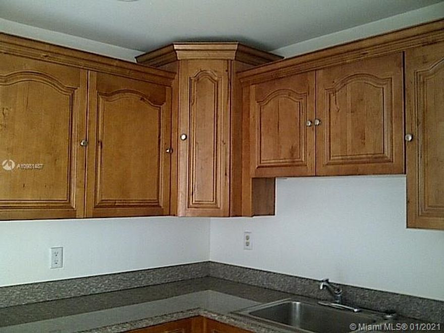 Beautiful 1/1 East of US1.  Tile throughout the entire unit.   Kitchen has granite countertops, wood cabinets, & crown moldings. Mirrored closet doors in bedroom & hallway.  Central Air.  Rent includes water & sewer.