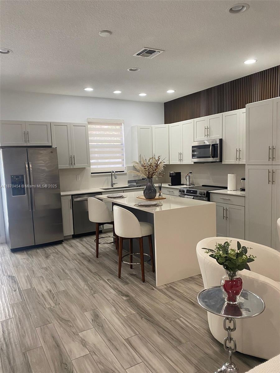 Beautiful 3-bed / 3-bath townhouse for rent in a gated community! This fully furnished home features modern furniture, a spacious layout, and a one-car garage. Conveniently located near top-rated schools and just minutes from I-75 for easy commuting. Move-in ready and perfect for comfortable living!
