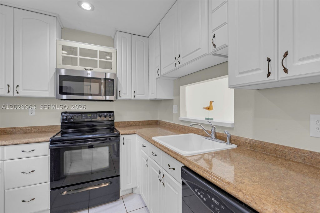 Photo of 4805 NW 35th St #416, Lauderdale Lakes, FL 33319 (MLS # A12028664)