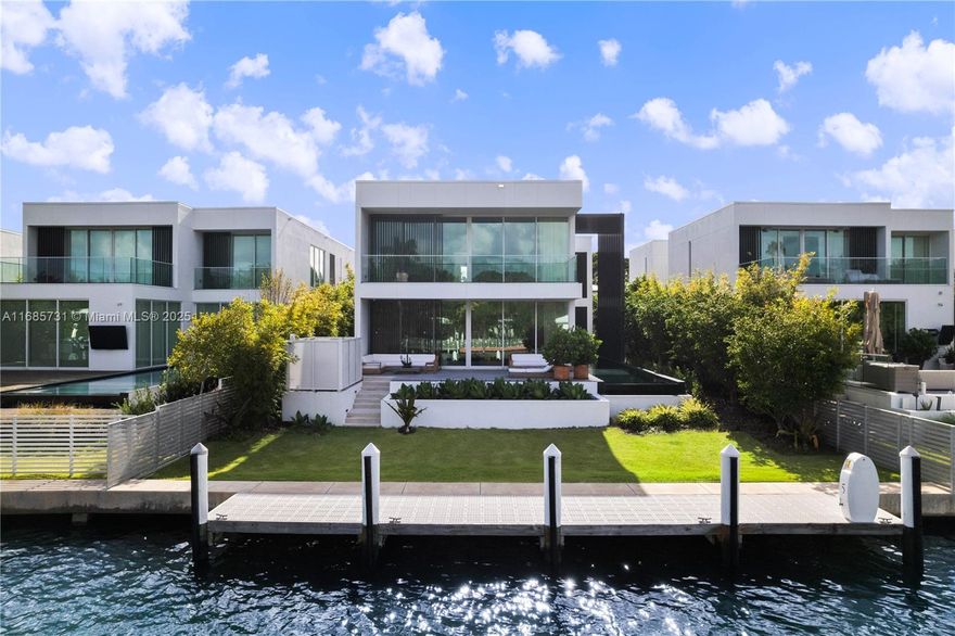 Indulge in the pinnacle of modern living in one of only 8 exclusive single-family villas at The Ritz-Carlton Residences. Designed by renowned architect Piero Lissoni, this 2-story, 5,000-SF estate offers 4 BR,4.5 BA & 55’ of WF, private dock w/ Biscayne Bay & Atlantic Ocean access & a heated lap pool, creating a sanctuary of tranquility & elegance. Sophisticated interiors feature Venetian plaster walls, white oak floors & custom stone finishes. Boffi kitchen equipped w/ Gaggenau appliances, blends beauty & functionality for effortless entertaining. Luxuriate in the serene primary suite w/ dual walk-in closets, private balcony & a spa-inspired Boffi bathroom. Rare opportunity to enjoy the privacy of a villa w/ the world-class amenities, services, & luxurious lifestyle of The Ritz-Carlton