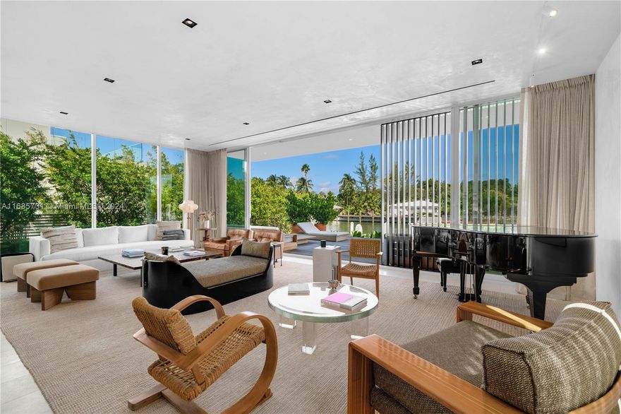Indulge in the pinnacle of modern living in one of only 8 exclusive single-family villas at The Ritz-Carlton Residences. Designed by renowned architect Piero Lissoni, this 2-story, 5,000-SF estate offers 4 BR,4.5 BA & 55’ of WF, private dock w/ Biscayne Bay & Atlantic Ocean access & a heated lap pool, creating a sanctuary of tranquility & elegance. Sophisticated interiors feature Venetian plaster walls, white oak floors & custom stone finishes. Boffi kitchen equipped w/ Gaggenau appliances, blends beauty & functionality for effortless entertaining. Luxuriate in the serene primary suite w/ dual walk-in closets, private balcony & a spa-inspired Boffi bathroom. Rare opportunity to enjoy the privacy of a villa w/ the world-class amenities, services, & luxurious lifestyle of The Ritz-Carlton