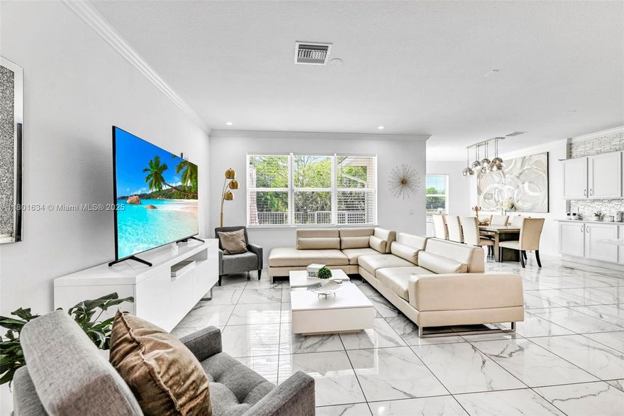 Experience luxury living in the gated community of Parkview at Hillcrest. This elegant 3 bed, 2.5 bath townhouse features a sleek, modern design with high-end finishes and top-tier appliances. The open concept layout is filled with natural light, seamlessly connecting the living, dining, and kitchen areas—ideal for entertaining. Upstairs, the spacious master suite offers a spa-like bathroom with dual vanities, walk in closet, and walk in shower. Enjoy serene water views from your private backyard oasis. Community amenities include tennis courts, resort-style pool, fitness center, clubhouse, and more.