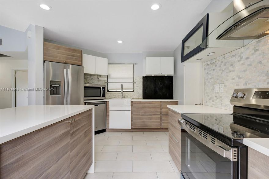 This one story home sits in the heart of Pembroke Pines. Best value for 2 bedrooms plus another room that can be a 3rd bedroom or office, along with 2 renovated bathrooms, garage & a private backyard with screened in porch overlooking the lake. Inside you’ll find an open concept renovated kitchen with new Stainless-S appliances & plenty natural light. The living areas feature tile flooring, while the bedrooms have wood laminate floors & ceiling fans for added comfort. The master bedroom includes a spacious walk-in closet & there’s plenty of closet space throughout the home. The tile roof replaced 9 years ago, ensuring plenty of life expectancy. The community features a kids’ play area & is pet-friendly. Home located just minutes away from shopping, restaurants, parks & highways. A must see