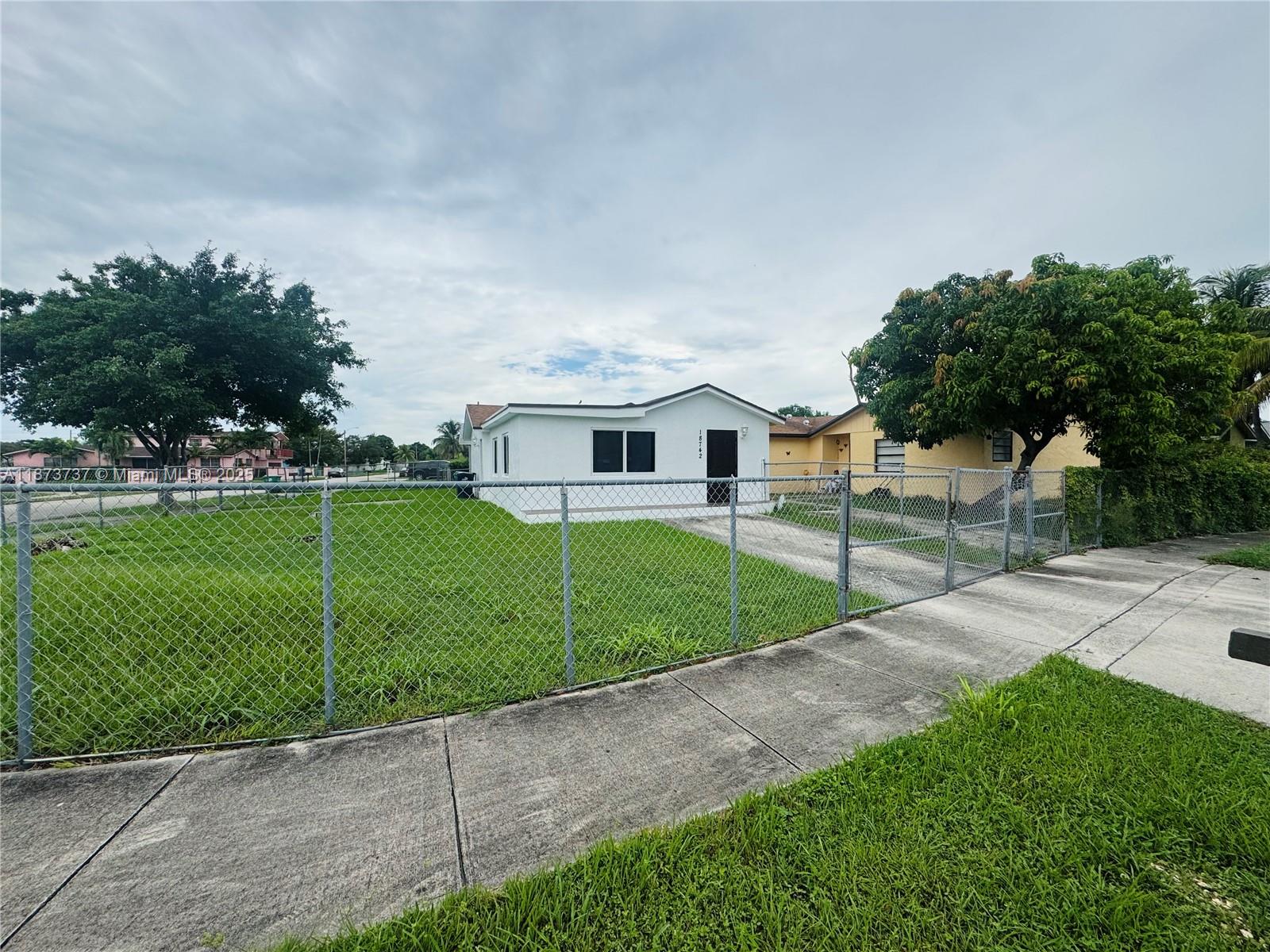 Welcome home to this beautifully renovated home in the heart of an up-and-coming neighborhood! This inviting, home is ready with 4 spacious rooms, 2 full bathrooms, one with a shower and one with a tub, hurricane-resistant windows providing an abundance of natural lighting, stainless steel appliances, fenced-in private yard, and plenty of parking. Walking distance, you’ll find the fun Quail Roost park, grocery stores, restaurants, and public transit, plus easy access to the turnpike for stress-free commutes. This welcoming community is buzzing with charm and opportunity. *Section 8 friendly* Come see this great home today!