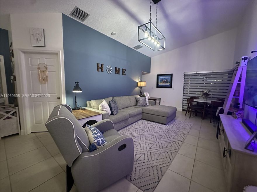 Beautifully remodeled ground-floor condo featuring an updated kitchen with modern cabinetry and stainless appliances. Located in an intimate cluster of just four units, this residence offers privacy, comfort, and a serene garden-style setting as the unit opens to lush greenery. Enjoy a quaint enclosed patio, perfect for relaxing or entertaining, along with convenient ground-level access. The community also features a pool, adding to the inviting lifestyle this charming home provides.