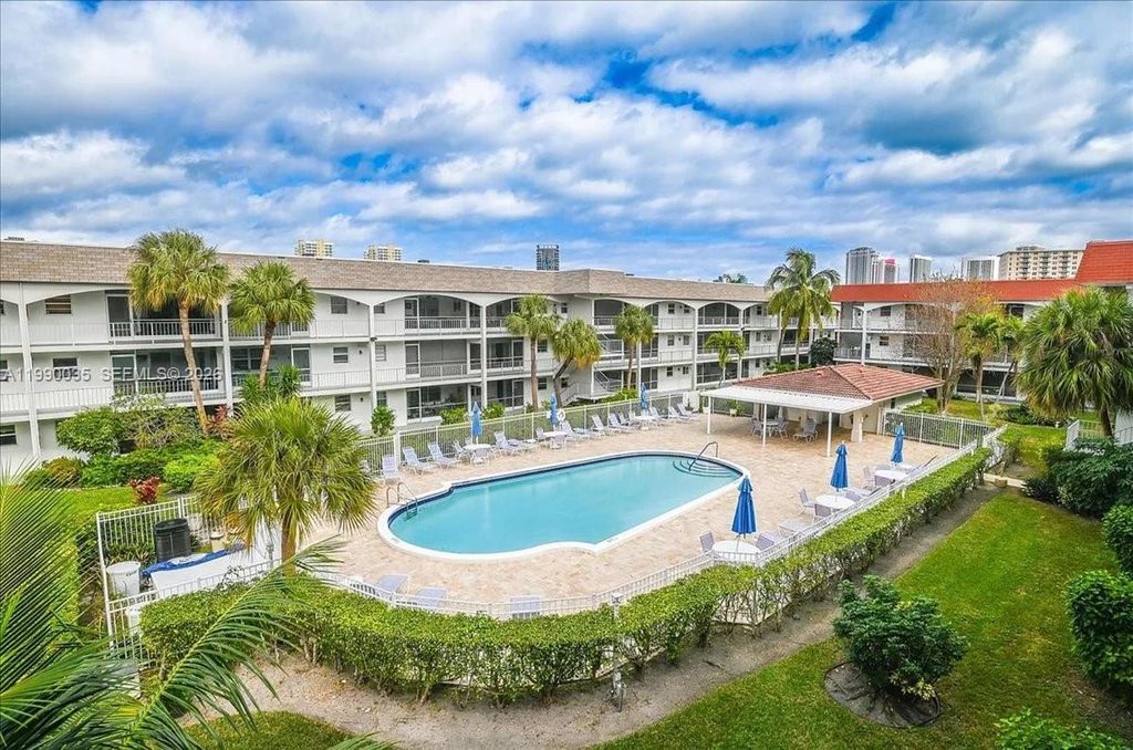 Photo of 581 Blue Heron Dr #205-B, Hallandale Beach, FL 33009 (MLS # A11990035)