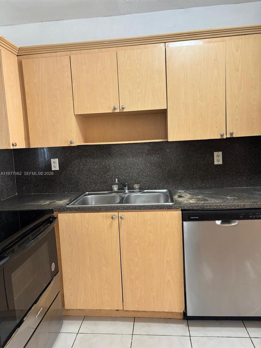 Bright and spacious 2-bedroom, 1-bathroom unit conveniently located on the first floor in the North Miami area. This well-maintained home features tile flooring throughout, a modern kitchen with stainless steel appliances, and plenty of natural light. The unit offers a large and comfortable layout plus a  back patio, perfect for relaxing or enjoying outdoor space. Great location close to shopping, dining, and major roads.